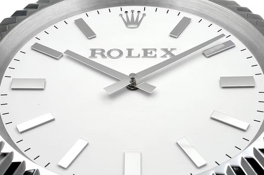 Rolex Luxury stainless steel wall clock featuring luminous markers and sweeping movement