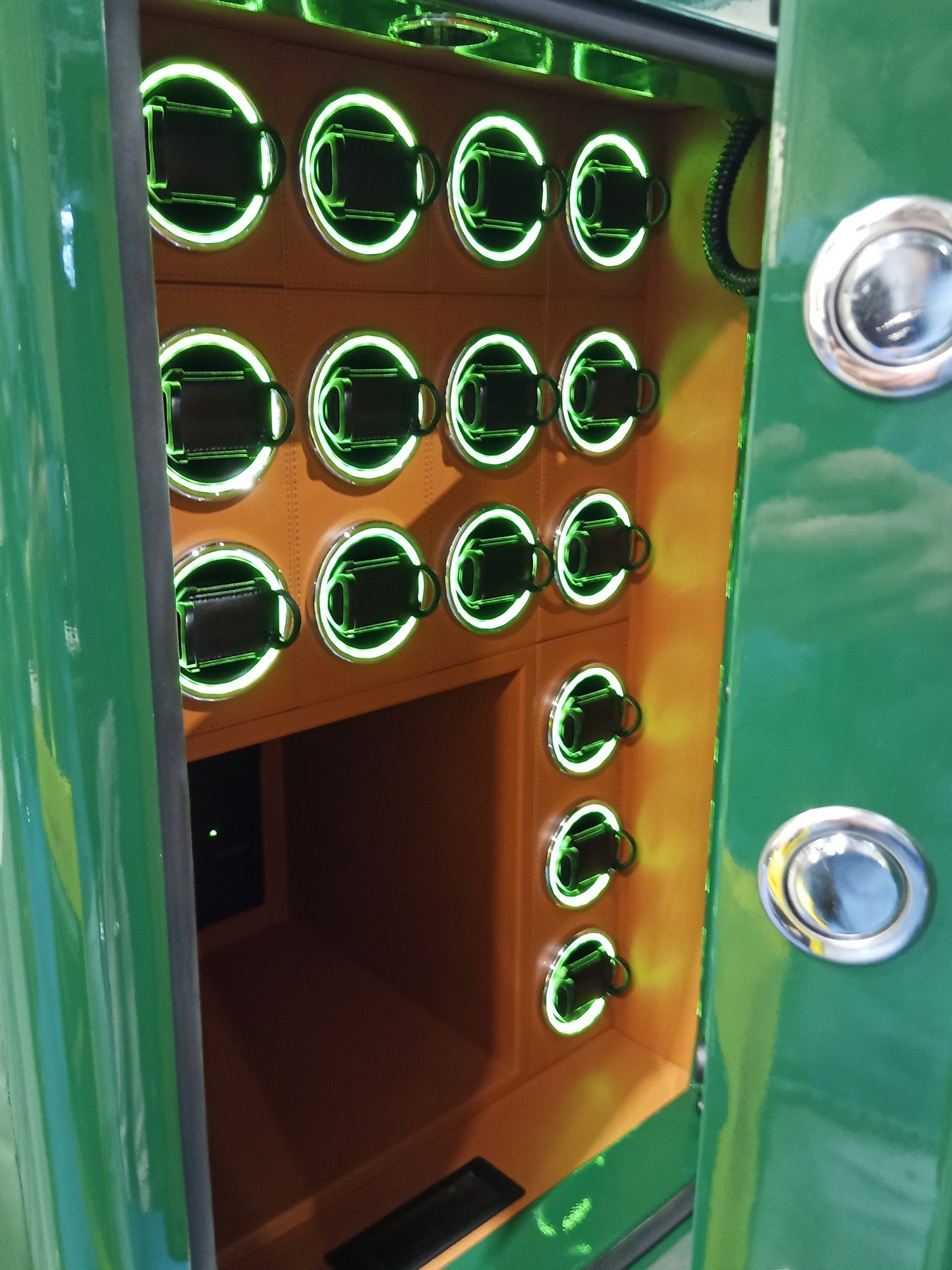 Luxury watch safe winder with multiple illuminated slots, touchscreen control, and a sleek steel-and-leather design. Securely winds and displays watches with silent precision and elegant Swiss craftsmanship.