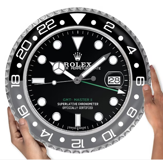 Close-up of black and grey dial on GMT Bruce Wayne wall clock