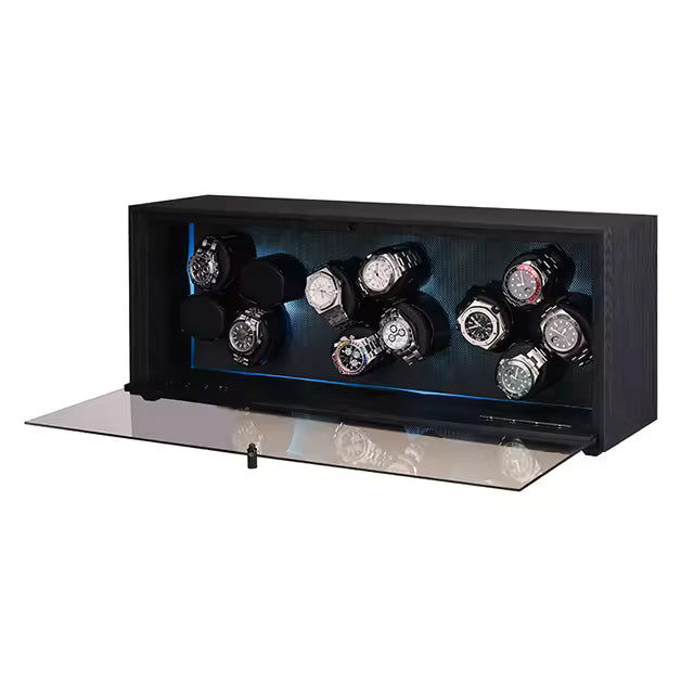 Open watch winder showing velvet interior and multiple watch slots