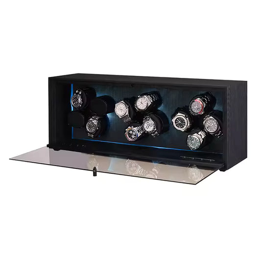 Open watch winder showing velvet interior and multiple watch slots